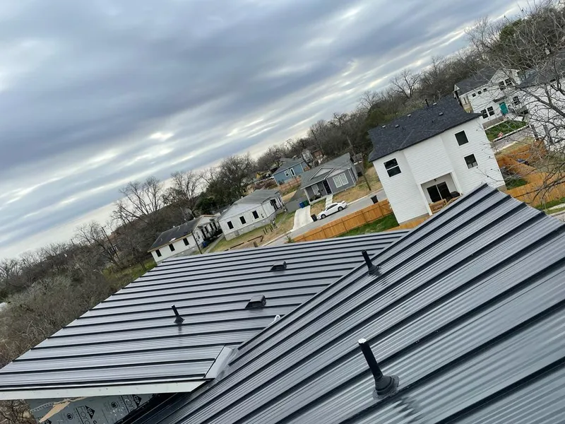 Standing seam metal roof panels with vents for Skylight Repair in Waconia